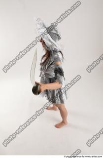 LUCI_AVIOL STANDING POSE WITH GUN AND SWORD